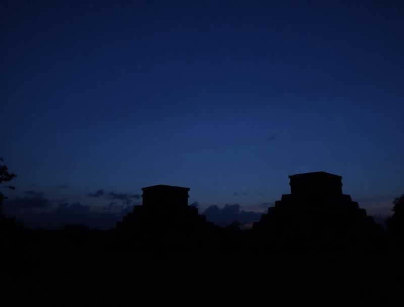 Pre-dawn purple sky over Chichen Itza ruins