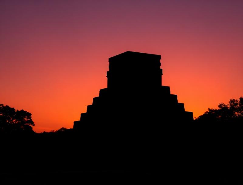 First light illuminating ancient stone carvings